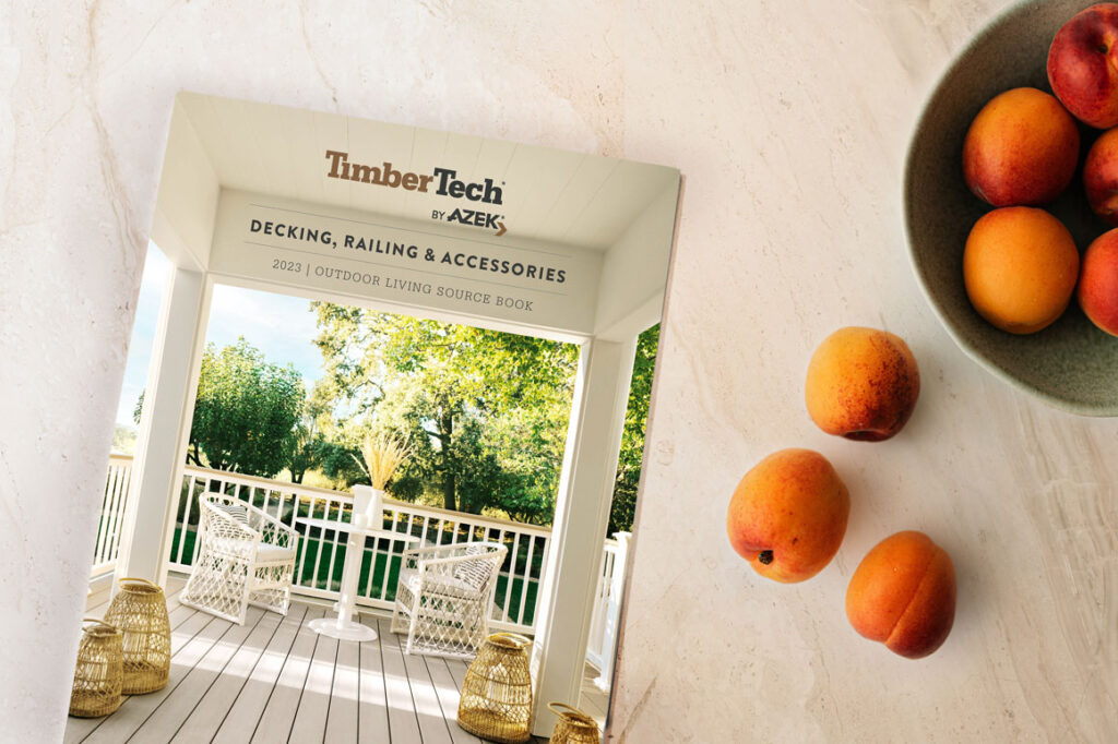 TimberTech Outdoor Living Source Book on countertop next to bowl of peaches