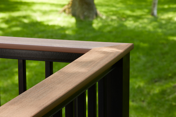 Corner detail shot of a Classic Composite Series railing with Drink Rail